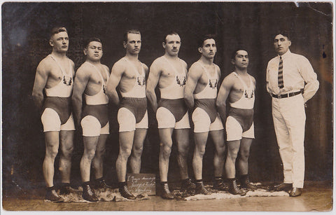Vintage photo men in rows (track team in white)
