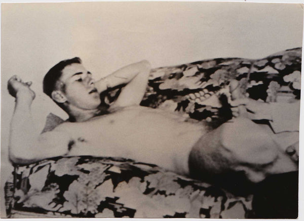 Vintage copy print of a handsome young guy reclining gay photo