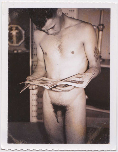 Male Nude Looking at Magazine 2: Vintage Polaroid