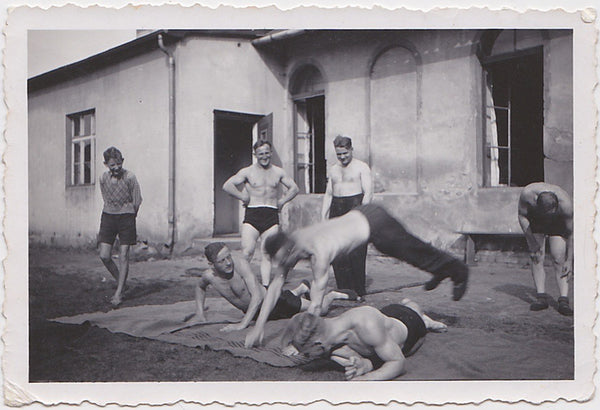 Guys Doing Gymnastics in Frankenstein vintage photo