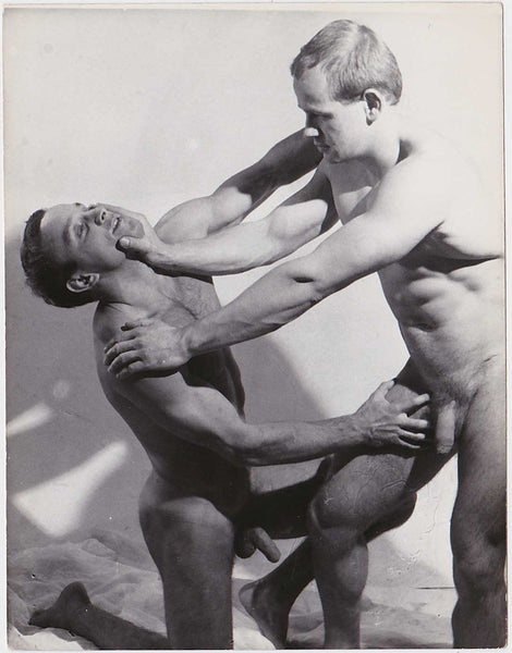 Vintage gay photo Two handsome muscular wrestlers struggle for dominance