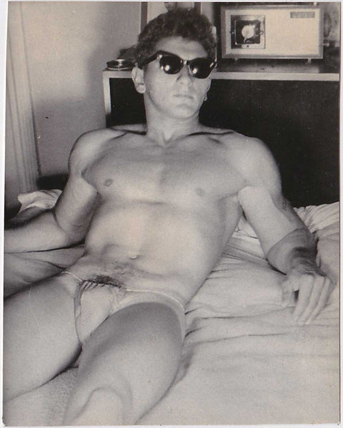 Bodybuilder Wearing Sunglasses in Bed vintage gay photo