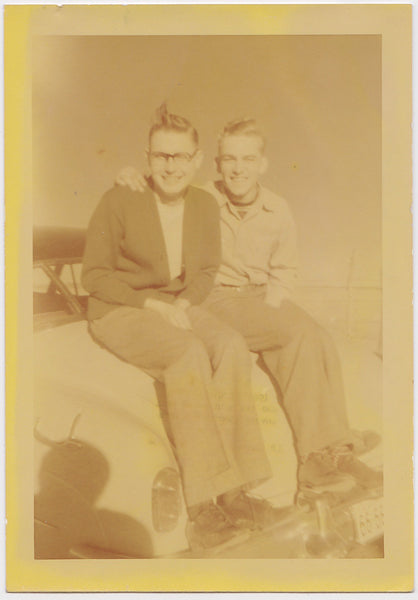 Affectionate Couple Sitting on Trunk vintage Kodacolor photo 1951.