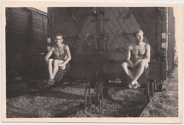 Two Men Sitting on Rail Car vintage gay snapshot