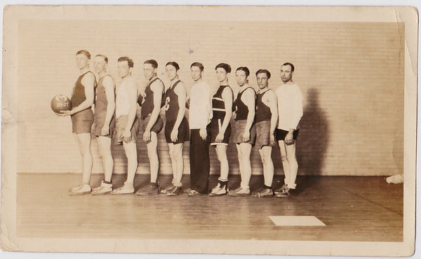 Vintage photo men in rows, basketball team 1926-27