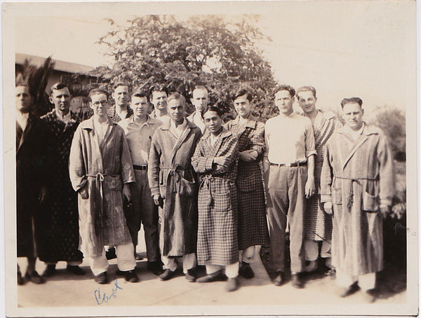 Group of men, mostly wearing bathrobes and slippers: vintage photo