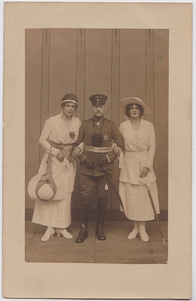 Officer and Two "Ladies" vintage real photo postcard