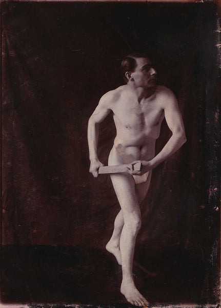Rare academic study of a male nude holding a long piece of wood. Probably an albumen print from the late 19th C.