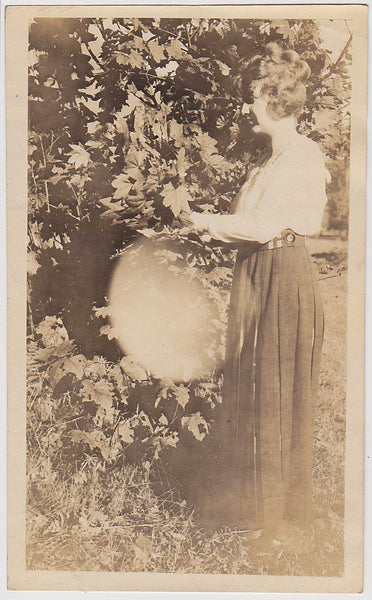 Woman with Translucent Orb vintage sepia photo