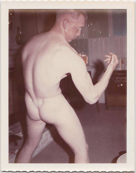 Vintage gay Polaroid Male Nude Holding a Glass