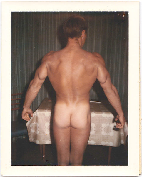 Bodybuilder showing off his massive back and glutes. vintage gay Polaroid