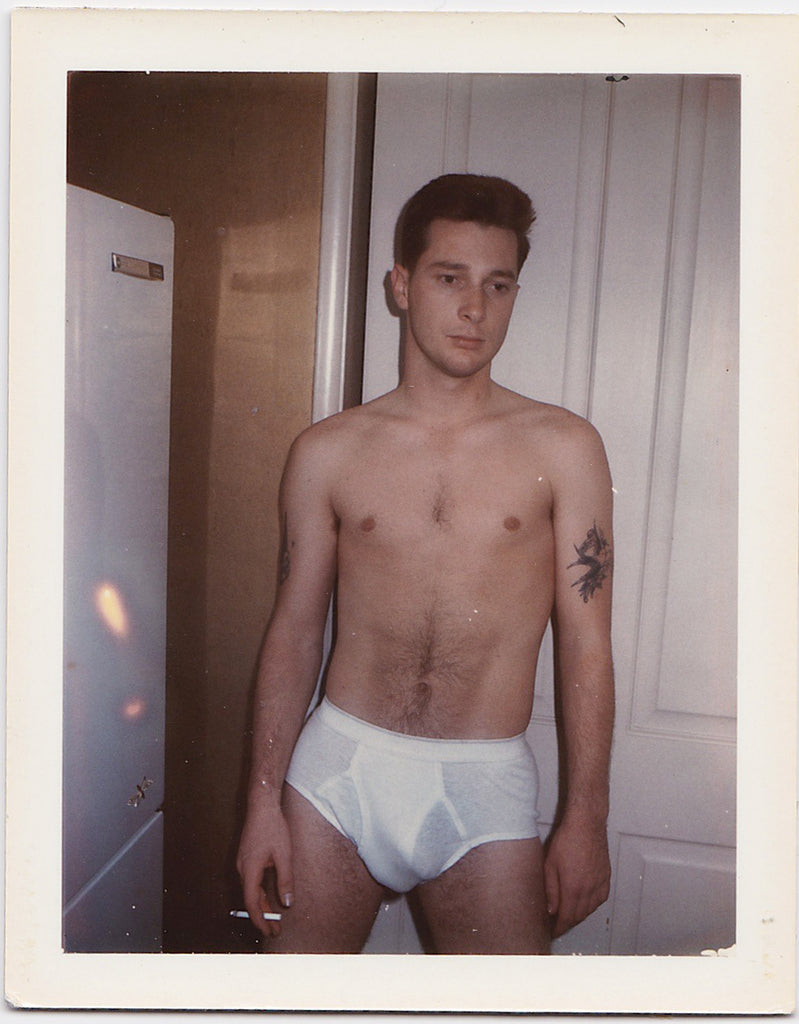 Vintage gay Polaroid, Somber Guy in Tighty-Whities