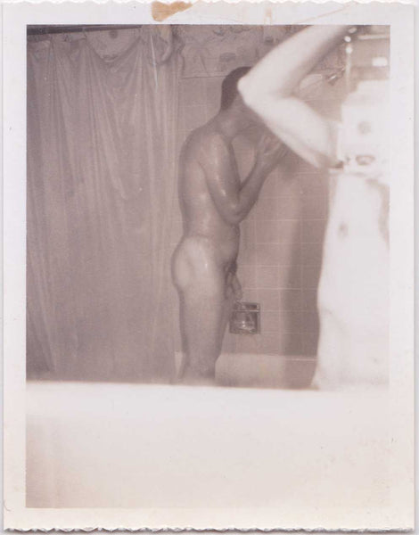Vintage gay Polaroid One man showers with the curtain open, another standing at the sink taking the photo in the mirror