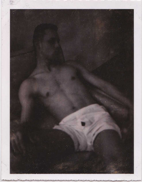 Handsome Guy on Bed #6: Vintage Polaroid