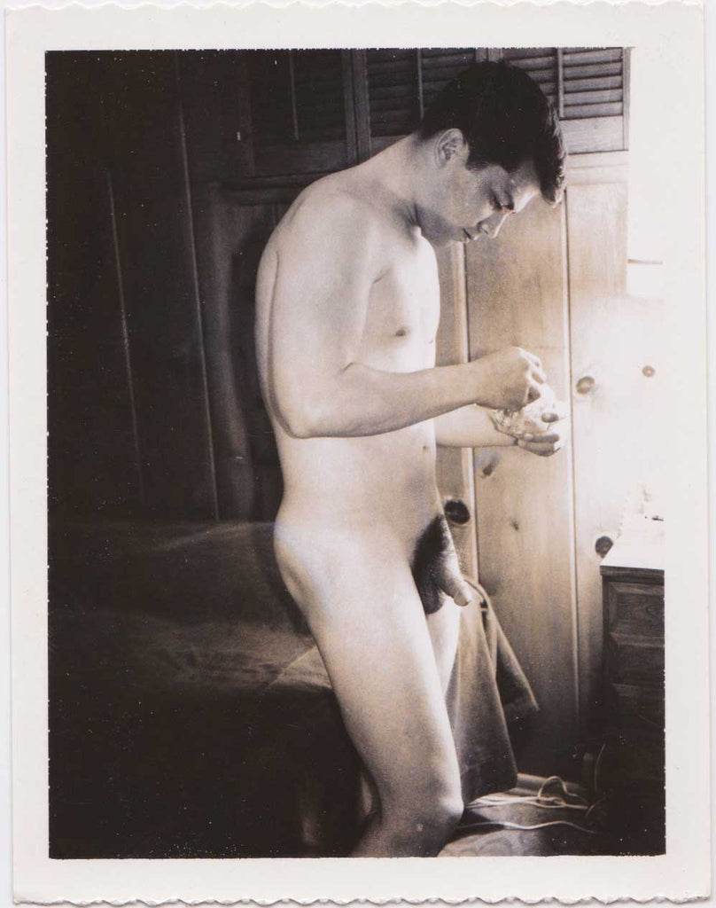 Vintage gay Polaroid Naked guy doing something with his hands