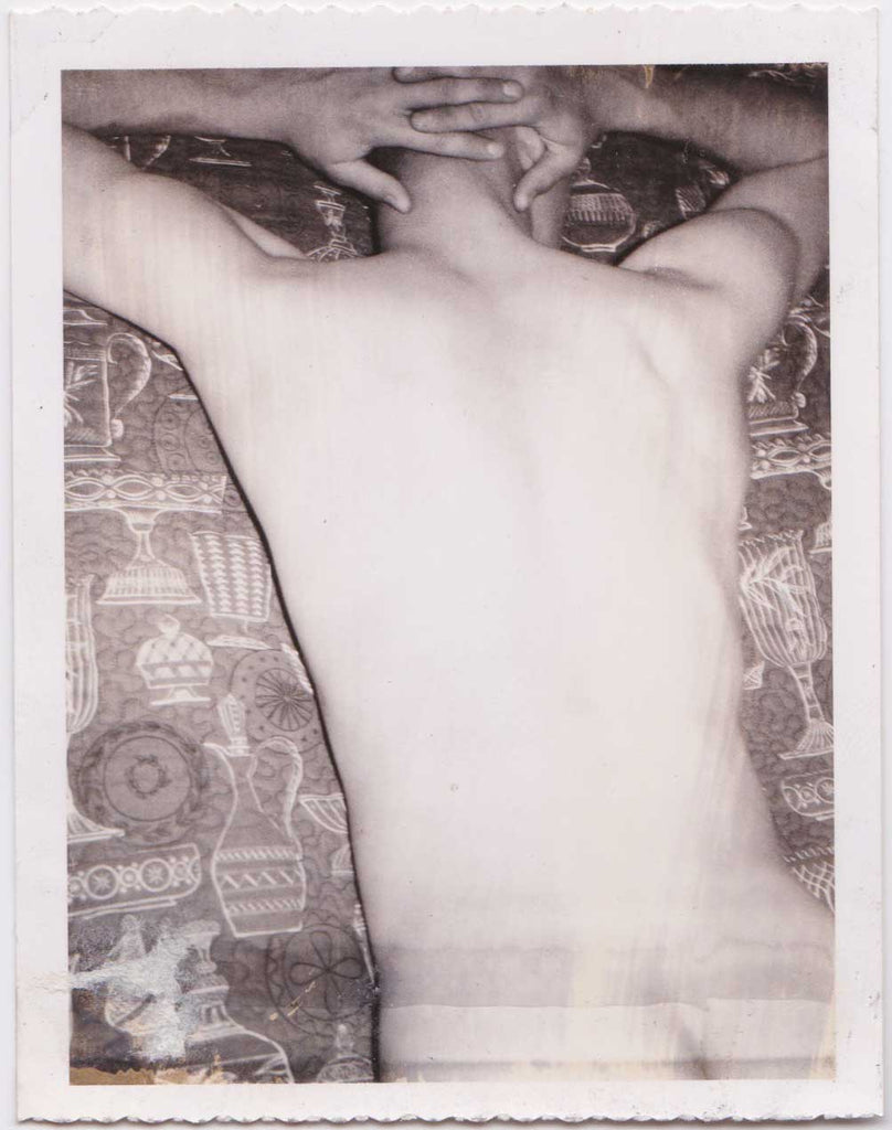 Male nude with his back to the camera and hands behind his head Vintage Gay Polaroid
