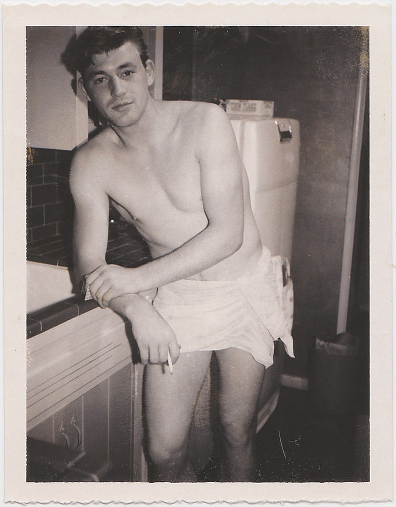 Vintage gay Polaroid Guy Wearing Towel, Smoking Cigarette