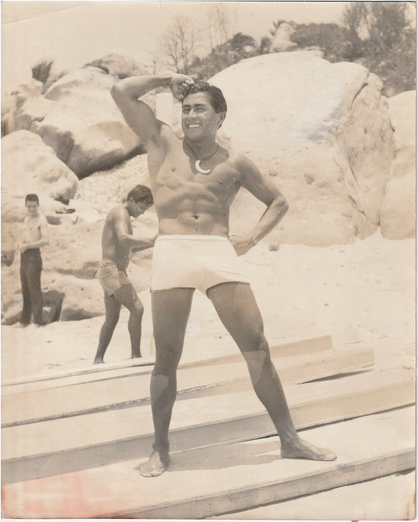 Vintage gay photo Muscular Man in White Swimsuit Flexing