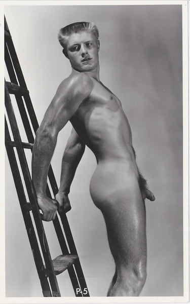 Handsome guy leaning back against a ladder. Great flat-top. Vintage gay photo Calafran J. Brian Studio