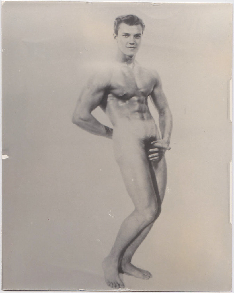 Handsome muscular male nude showing off. vintage gay photo