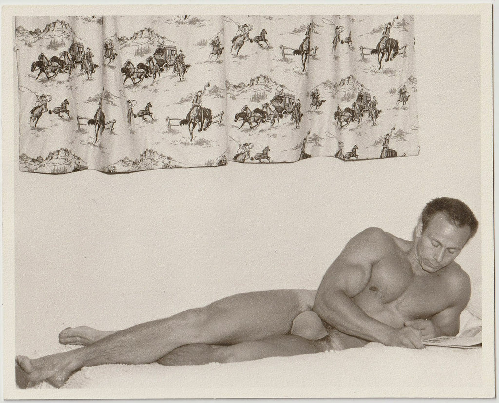 Western Photo Guild: Bodybuilder Reading vintage gay physique photo