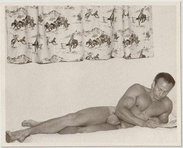 Western Photo Guild: Bodybuilder Reading vintage gay physique photo