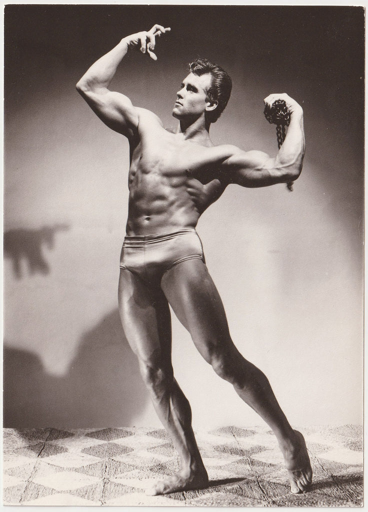 Ed Fury Flexing in the Studio vintage gay physique photo.