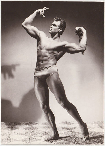 Ed Fury Flexing in the Studio vintage gay physique photo.