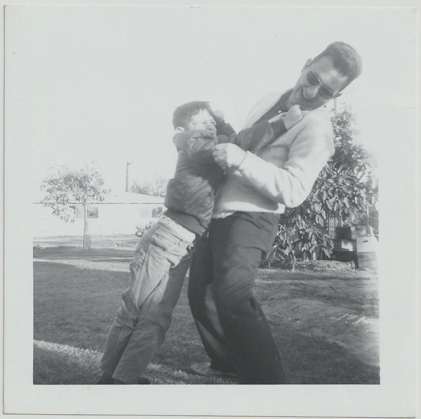 Father and Son Play-fighting