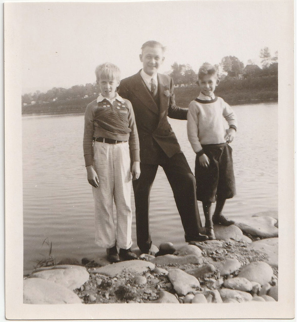 Father and Two Sons by the Water