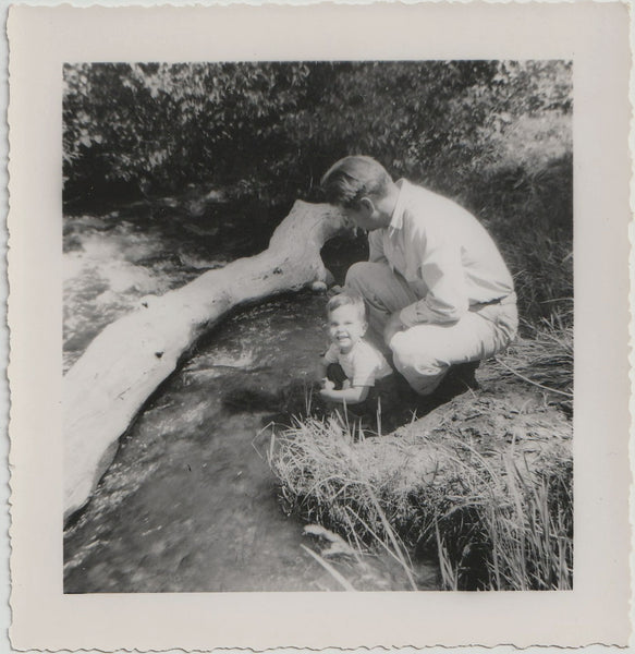 Father and Son by Stream