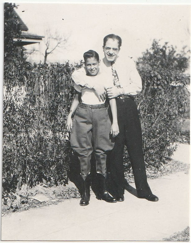 Father Embracing Son in Jodhpurs