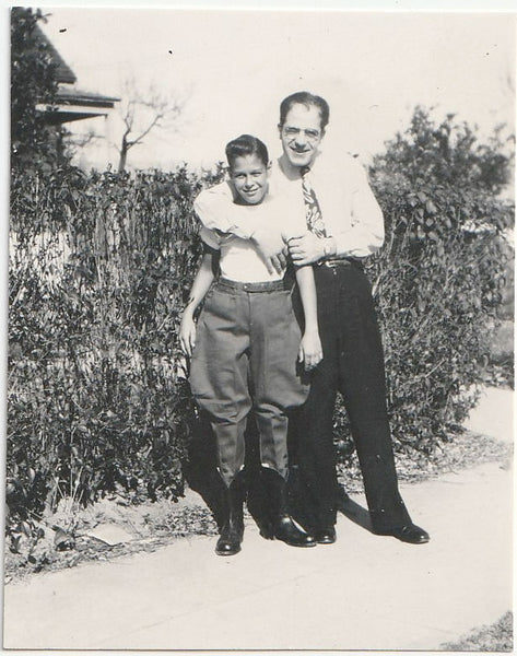 Father Embracing Son in Jodhpurs