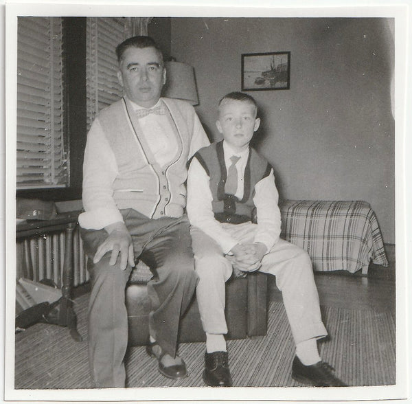 Glum But Stylish Father and Son