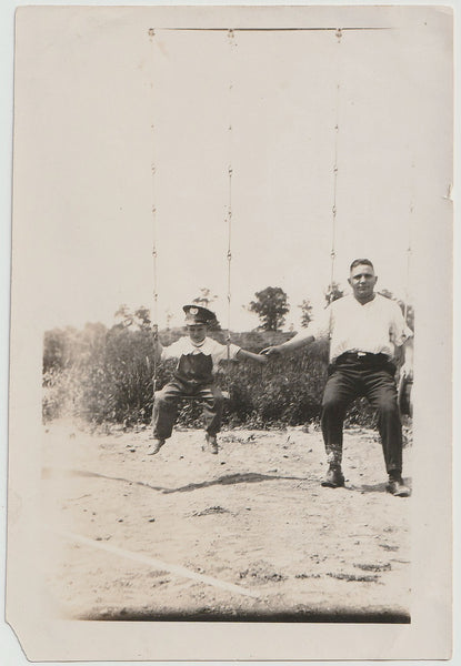 Father and Son on Swing Set