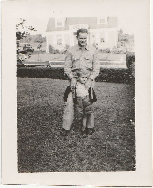 Father with Hands on Son's Shoulders