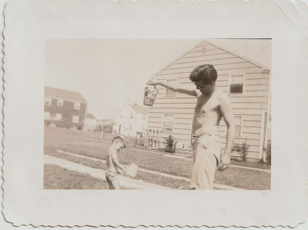 Father and Son Holding Pails