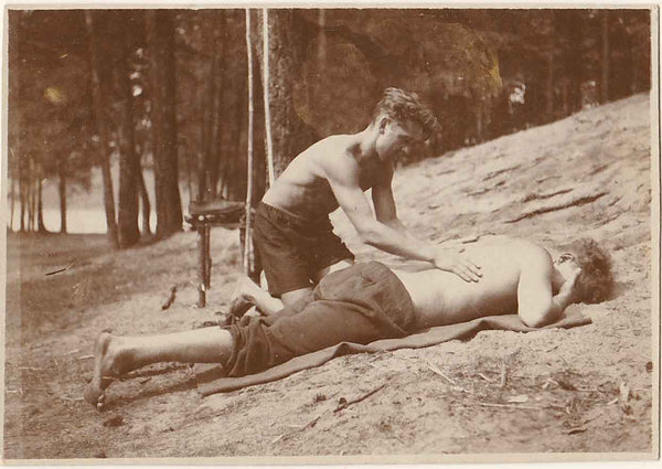 Rare vintage snapshot of a handsome young guy massaging his buddy's back 