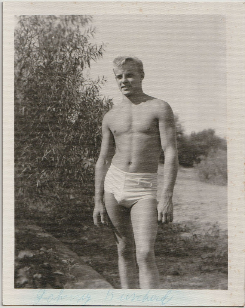 Handsome and very blond Johnny Buschard fills out those white shorts. Vintage gay physique photo attributed to Spectrum (Cincinnati, Ohio)