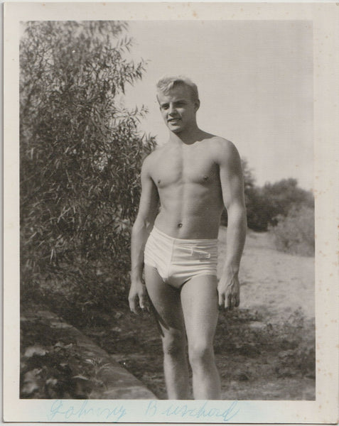 Handsome and very blond Johnny Buschard fills out those white shorts. Vintage gay physique photo attributed to Spectrum (Cincinnati, Ohio)
