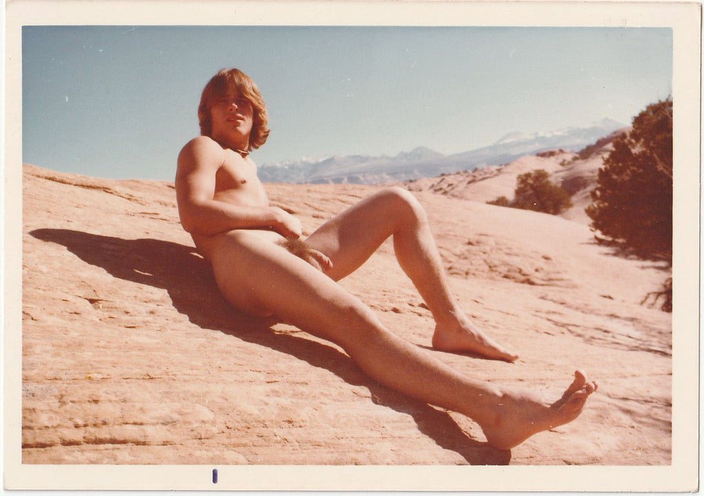 Long-Haired Naked Guy Reclining
