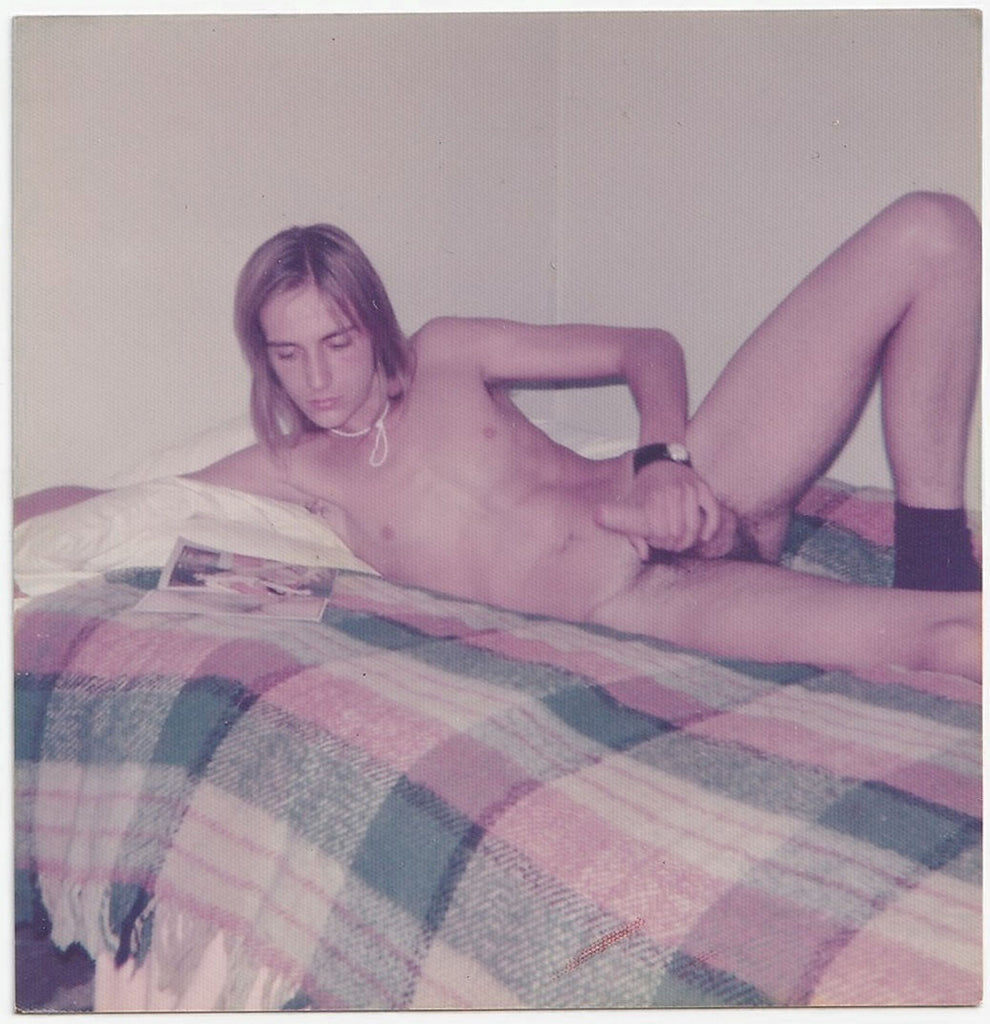 Long-haired Guy Looking at Gay Magazine vintage snapshot