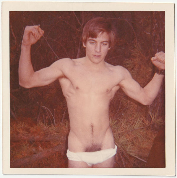 Male Nude Flexing Biceps