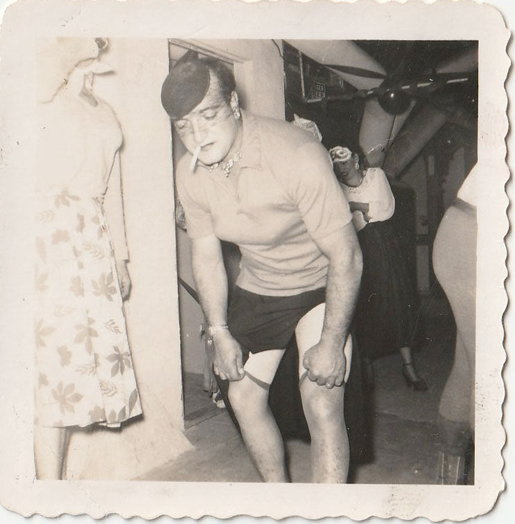 Cross-Dresser Pulling Up Stockings vintage gay snapshot