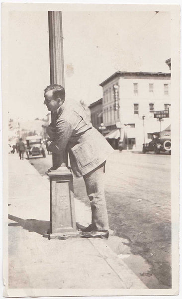 Man Hugging Street Lamp vintage snapshot
