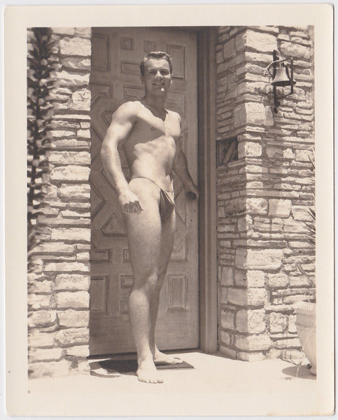 Handsome Bodybuilder at Front Door, vintage physique photo