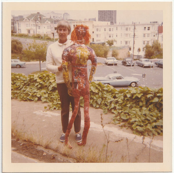 Pretty strange image of a guy and his papier mache girlfriend. vintage snapshot 1971
