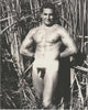 Vintage physique photo by Dave Martin. Beefy Dave Ellis squints into the sunshine.  Gym Instructor, Mission District, SF.