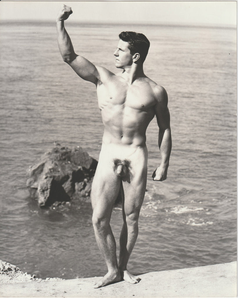 Paul Dixon poses by the edge of San Francisco Bay vintage physique photo by Dave Martin 1953.