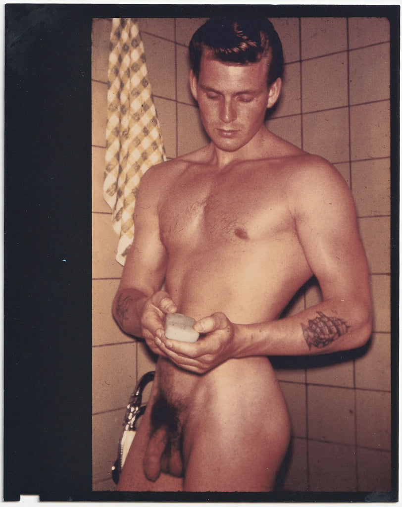Male Nude Holding a Bar of Soap